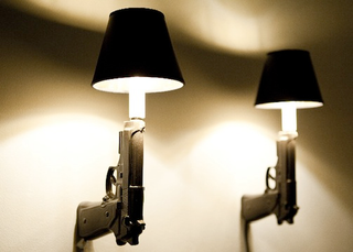 Illustration for article titled Light Up a Room with These Gun Lamps